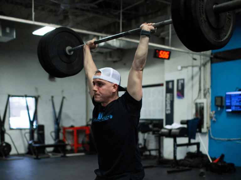 Crossfitter performs a metcon workout designed for health